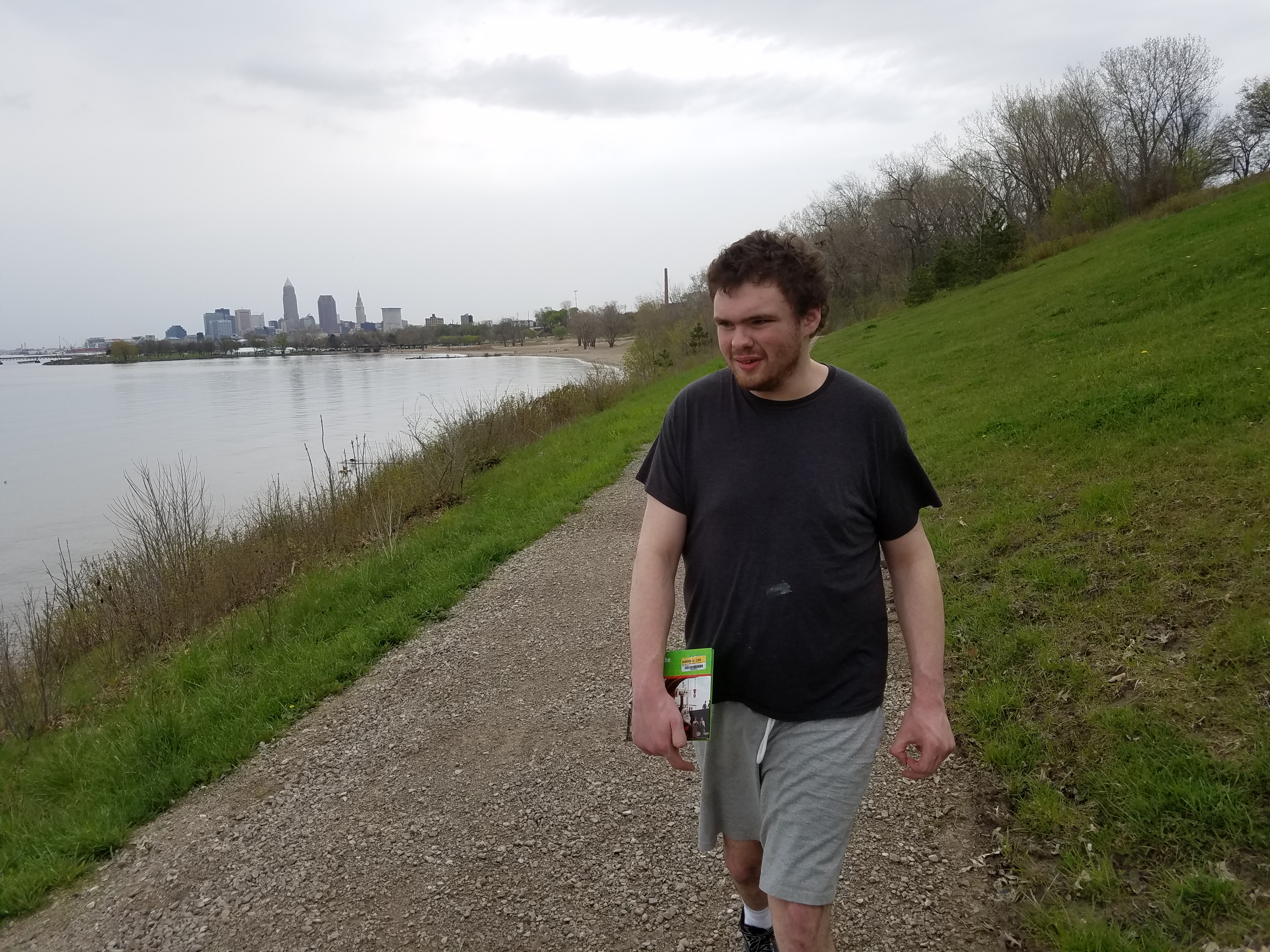 Ben and I enjoyed dodging raindrops on the Edgewater Park trail with Cleveland on the Lake Erie shore behind him.